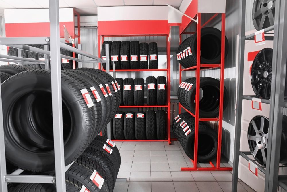 Tire Storage Area With Rows Of Black Tires Arranged — THG Tires in Gladstone Central, QLD