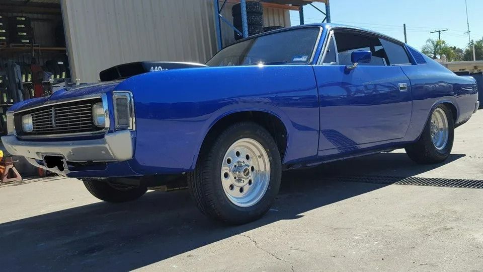 A Bright Blue Vintage Muscle Car With A Hood Scoop — THG Tires in Gladstone Central, QLD