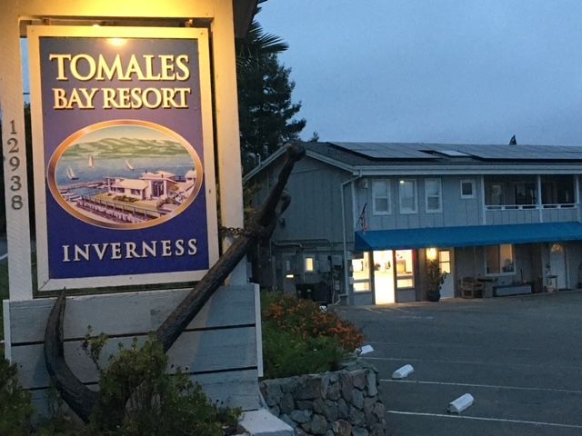 A sign for the tomales bay resort inverness