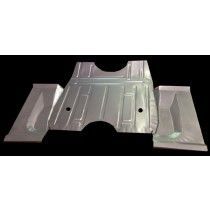 A shiny, metallic car part, a floor pan, angled on a dark surface.