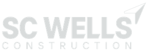 The logo for sc wells construction is gray and white