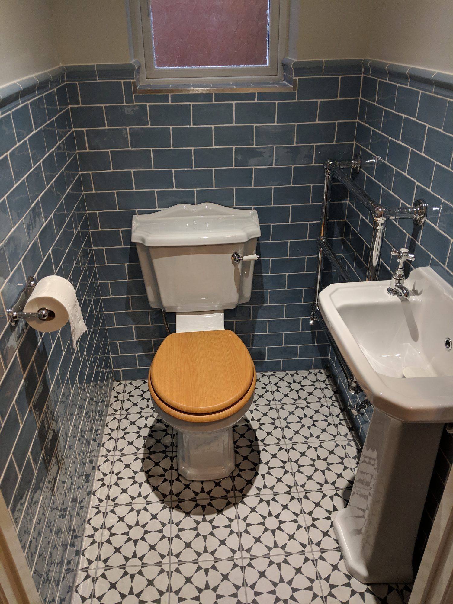 Traditional cloakroom WC with blue metro tiles