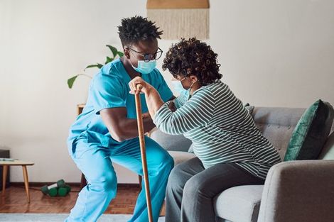 Professional Caregiver Helping the Old Woman — Brooklyn, NY — Safe Haven Home Care Professional Caregiver Helping the Old Woman — Brooklyn, NY — Safe Haven Home Care
