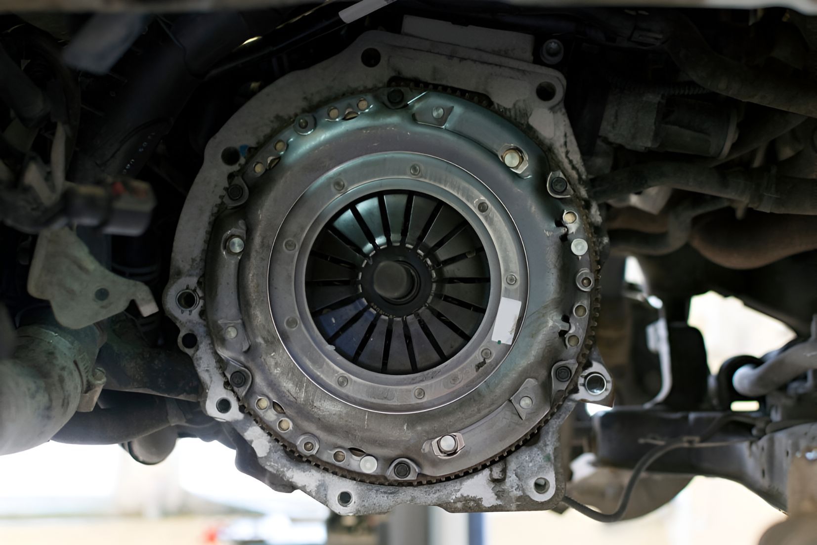 A Close Up of a Clutch on the Underside of a Car — K & T Ballina Mechanical In Ballina, NSW