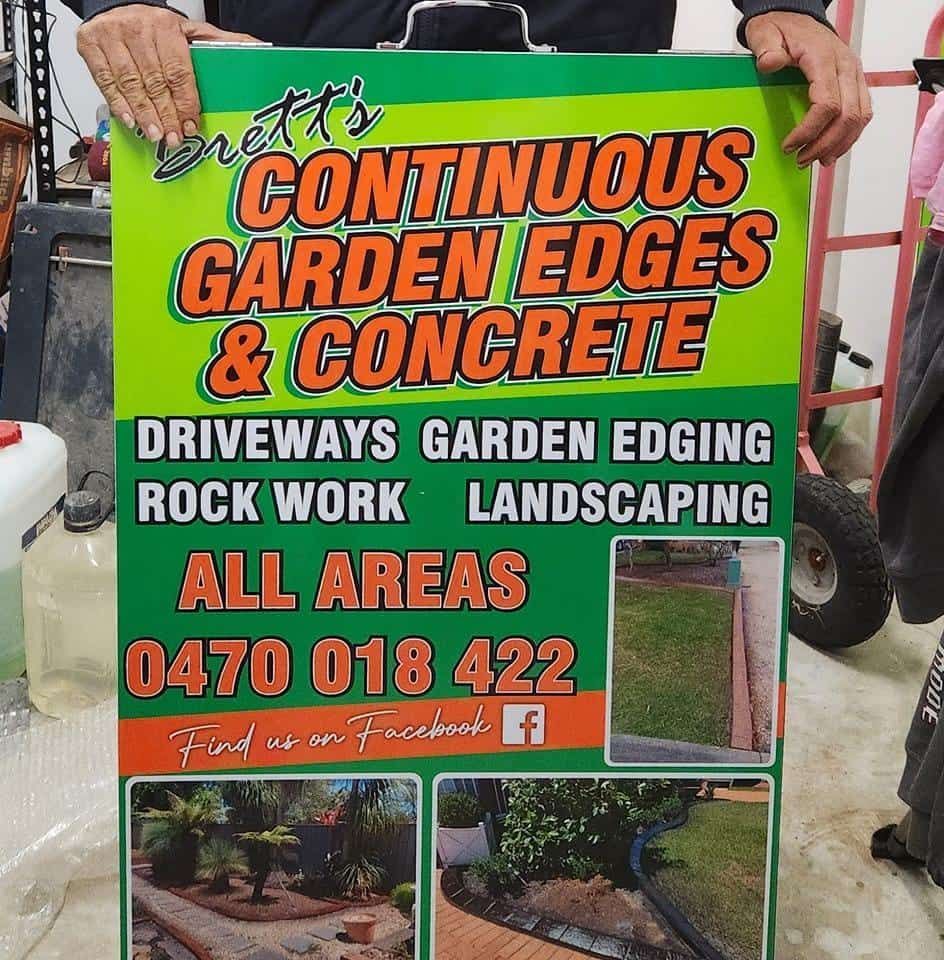 Advertisement Sign With Bold Orange and White Text — Brett's Continuous Garden Edges In Lakewood, NSW