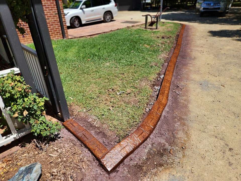 Red Brick Garden Edging — Brett's Continuous Garden Edges In Lakewood, NSW