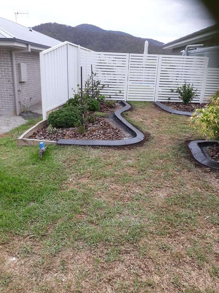 A Backyard Garden Bordered Flower Beds — Brett's Continuous Garden Edges In Lake Cathie, NSW