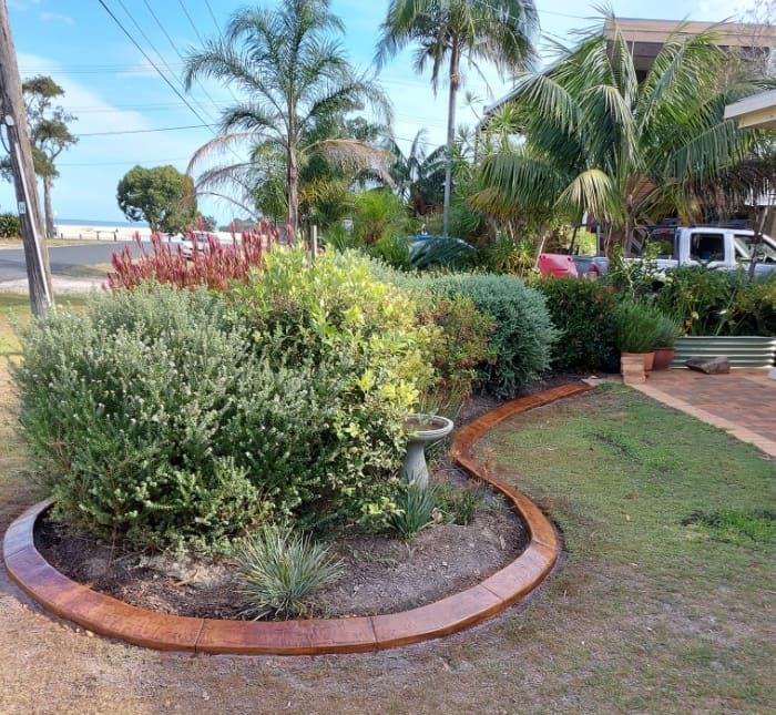 Lush Garden Bordered by a Curved Path — Brett's Continuous Garden Edges In Lakewood, NSW