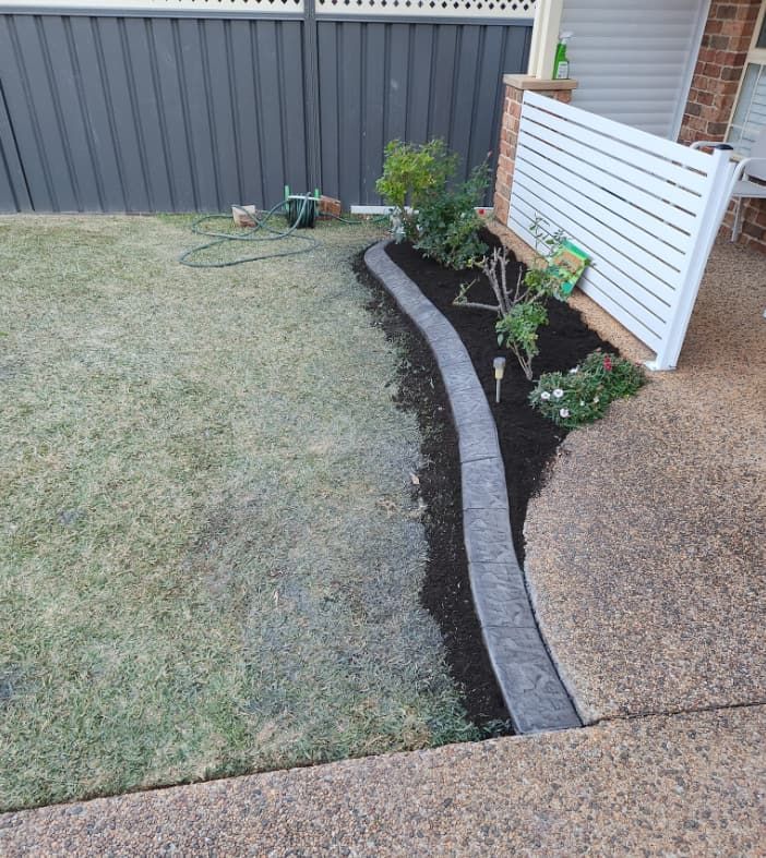 A Small Garden With Freshly Tilled Soil Borders — Brett's Continuous Garden Edges In Laurieton, NSW