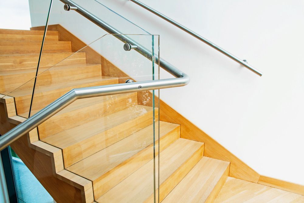 A Set Of Wooden Stairs With A Glass Railing — Scratchless Glass Australia in Buderim, QLD