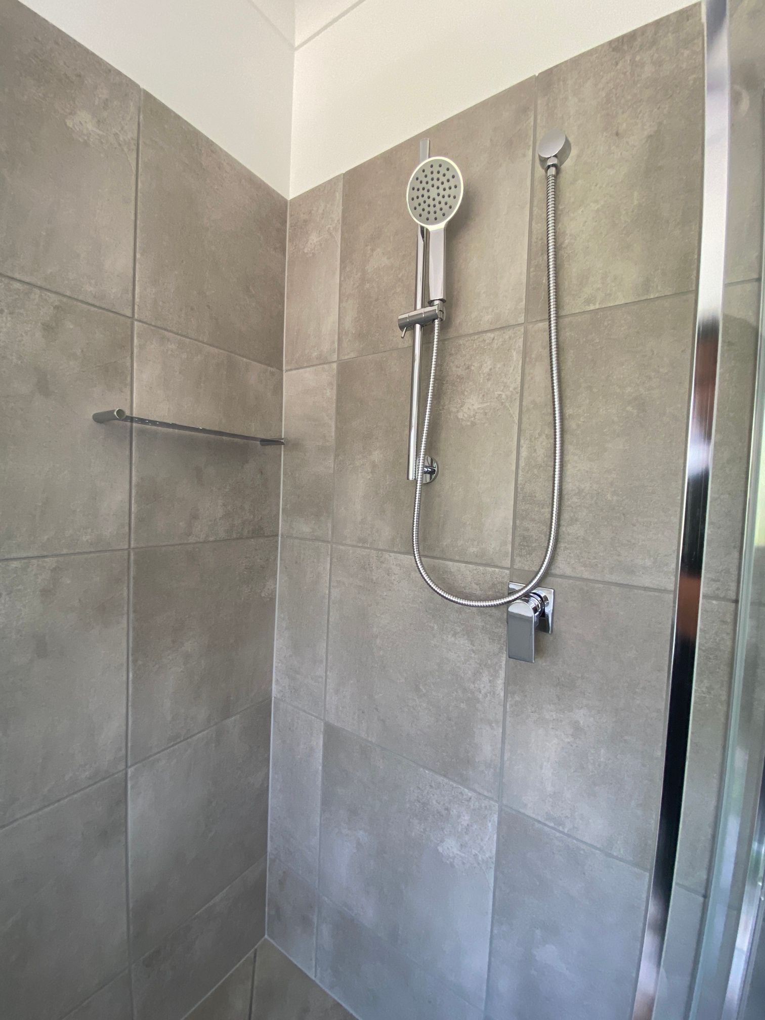 A Before And After Picture Of A Damaged Wall — Scratchless Glass Australia in Maroochydore, QLD