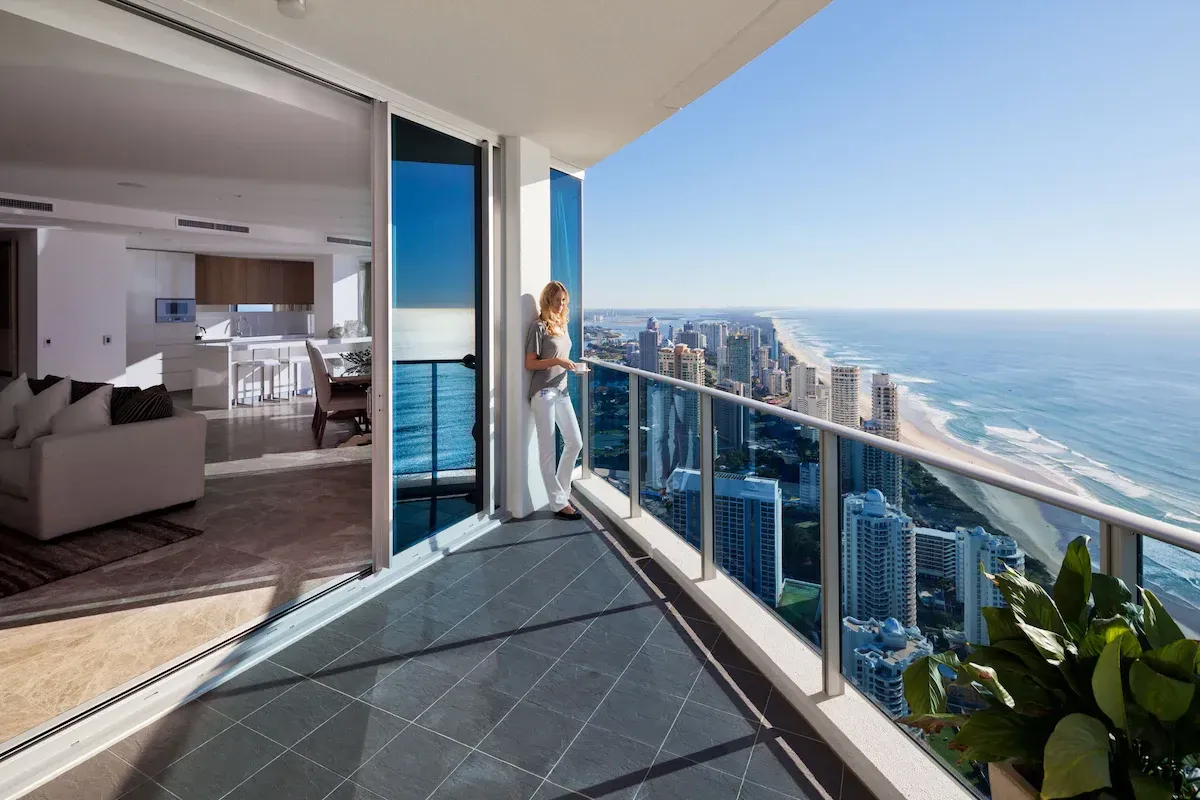 A Glass Railing With Stainless Steel Posts On A Balcony — Scratchless Glass Australia in Buderim, QLD