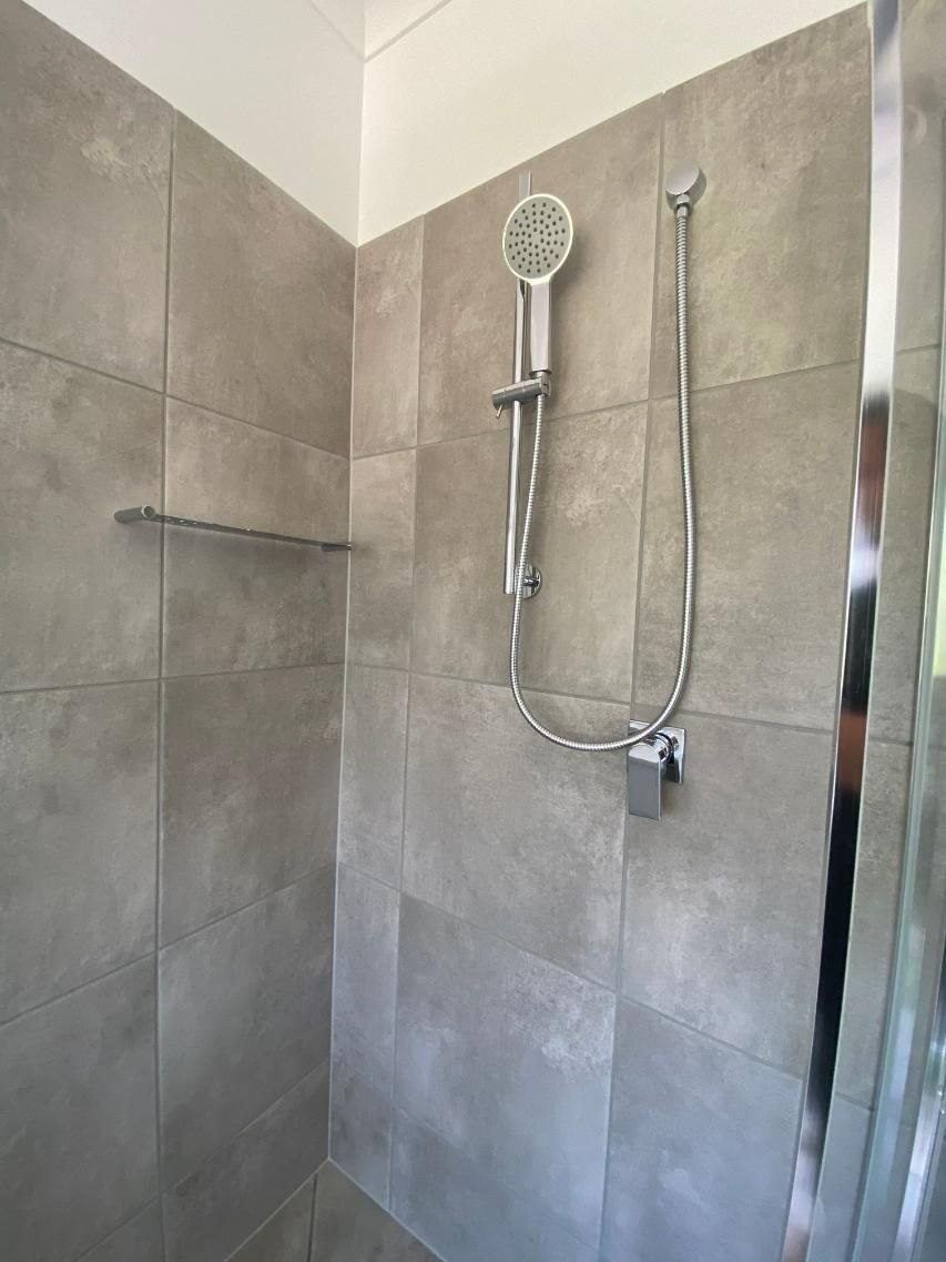 A Before And After Picture Of A Damaged Wall — Scratchless Glass Australia in Maroochydore, QLD