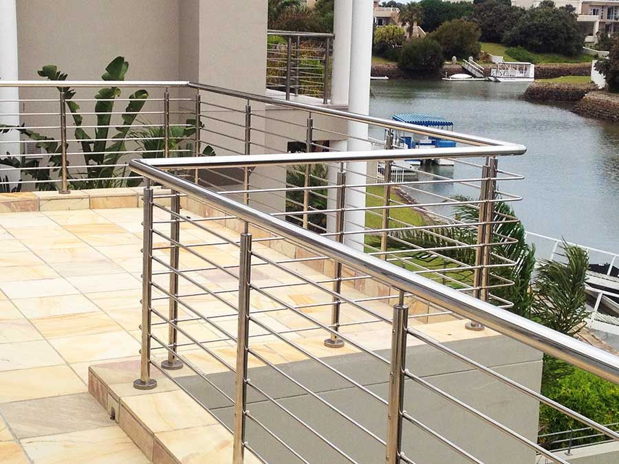 A Set Of Stairs With A Glass Railing In A Building — Scratchless Glass Australia in Maroochydore, QLD