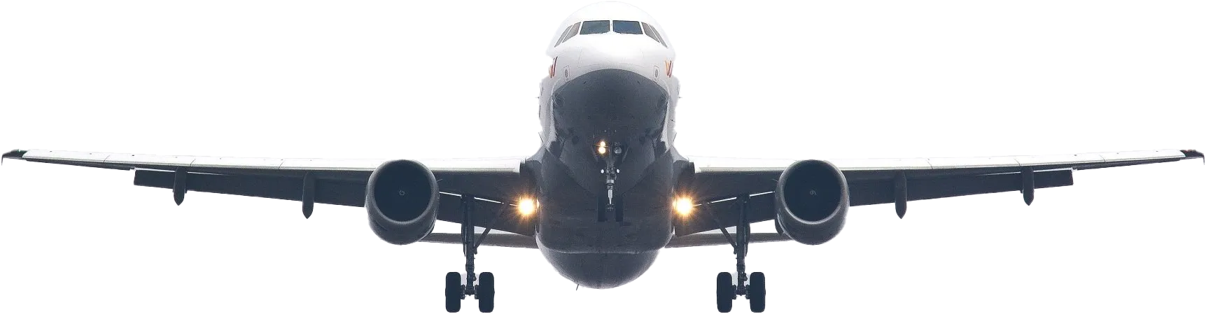 A large passenger jet is taking off from an airport.