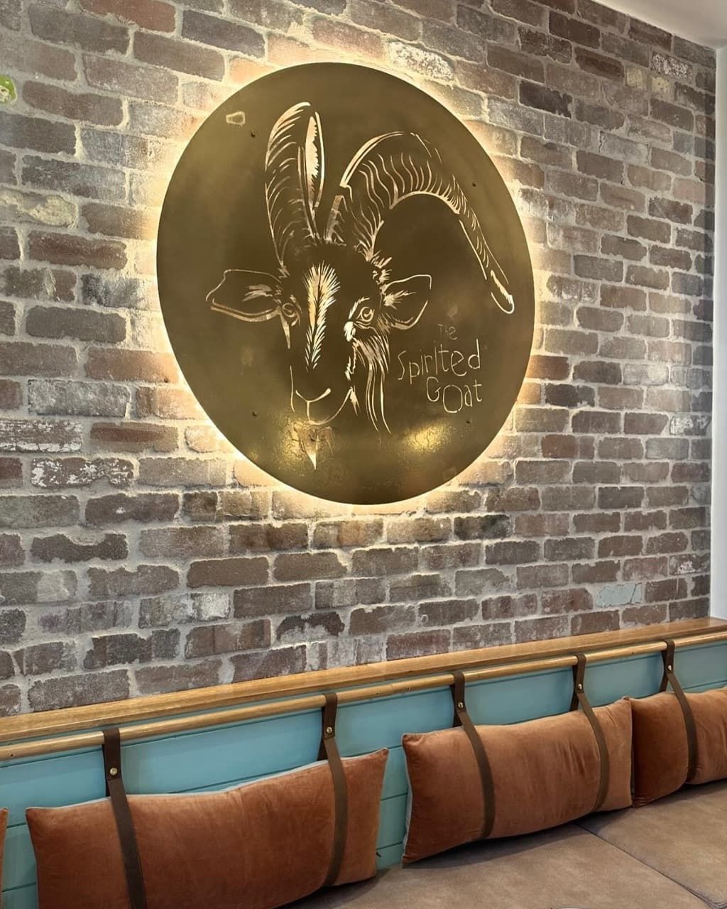 A Brick Wall With A Picture Of A Goat On It — Bigdog Welding and Fabrication Pty Ltd In Currajong, QLD