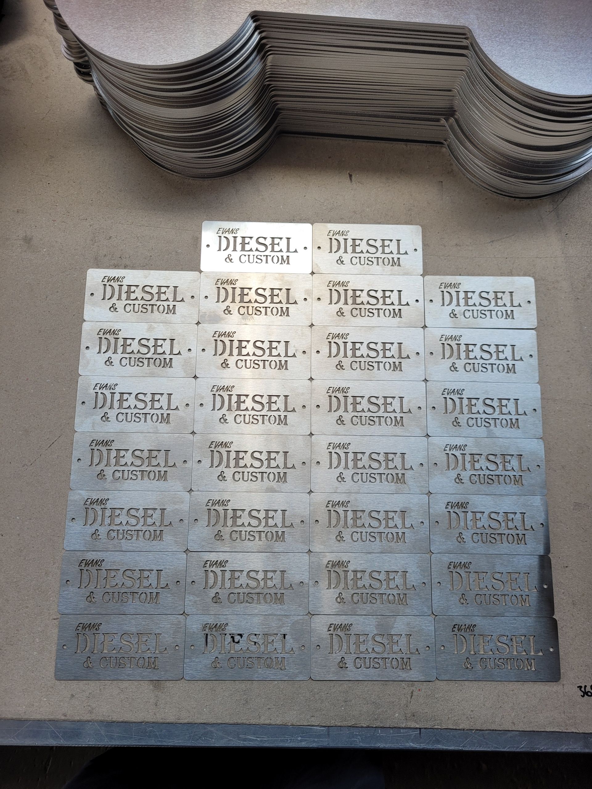 A bunch of diesel stickers are stacked on top of each other — Bigdog Welding and Fabrication Pty Ltd In Currajong, QLD