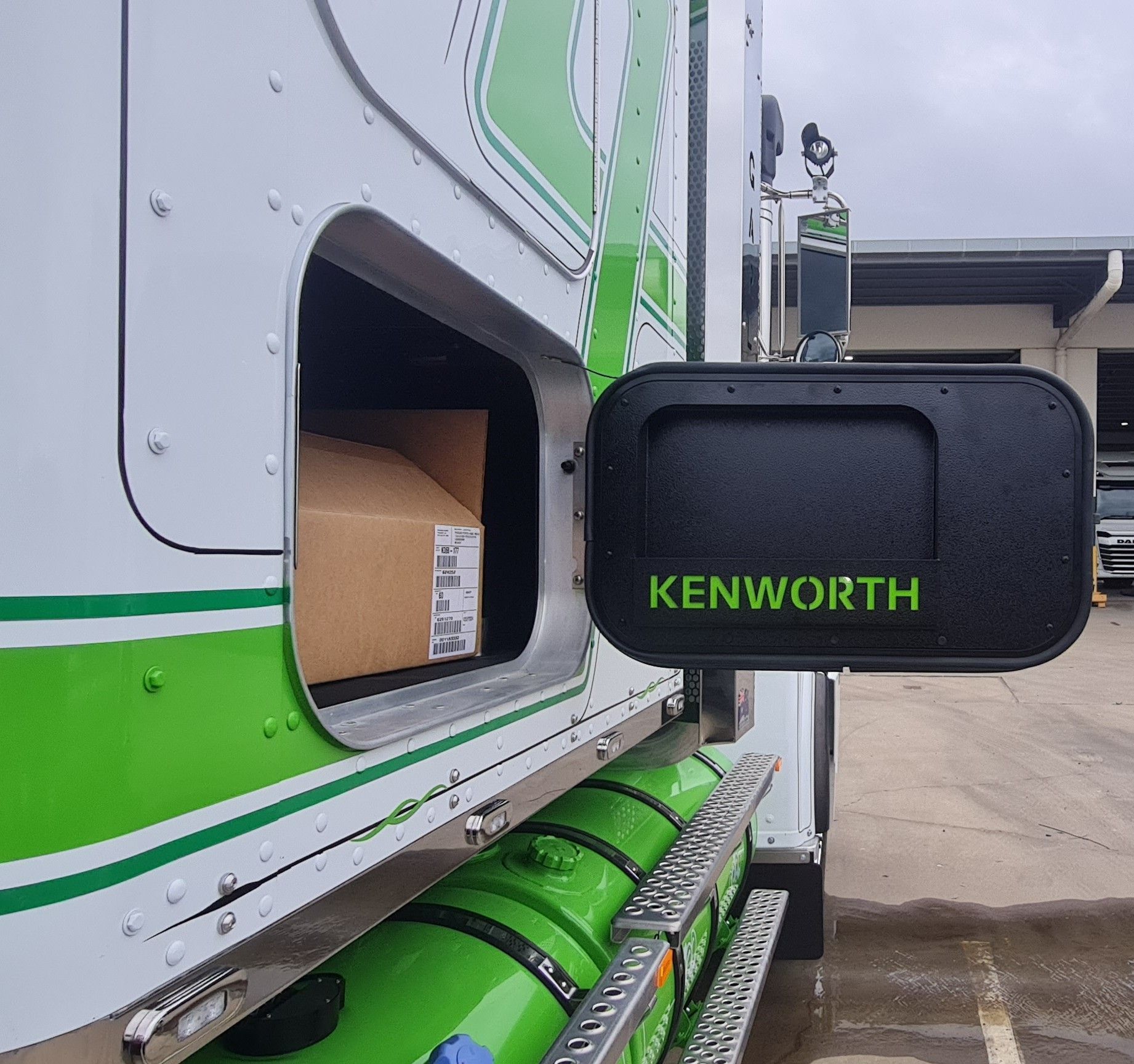 Kenworth Semi Truck With Open Compartment Holding A Box — Bigdog Welding and Fabrication Pty Ltd In Currajong, QLD