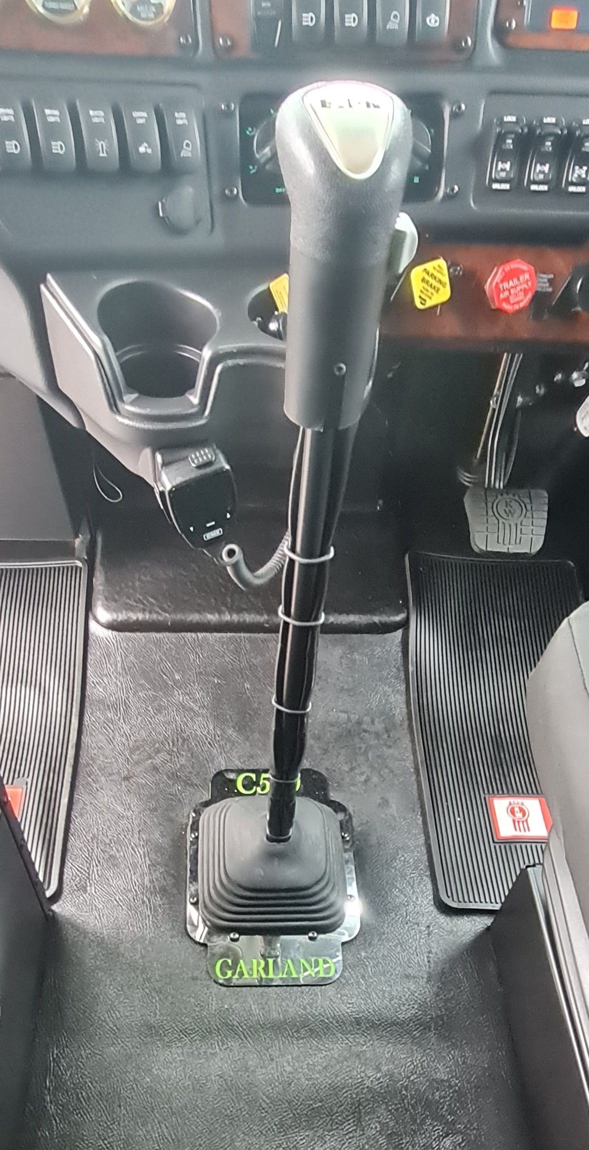 Gear Shift Lever In A Truck Cab. Black And Silver, On A Textured Floor — Bigdog Welding and Fabrication Pty Ltd In Currajong, QLD