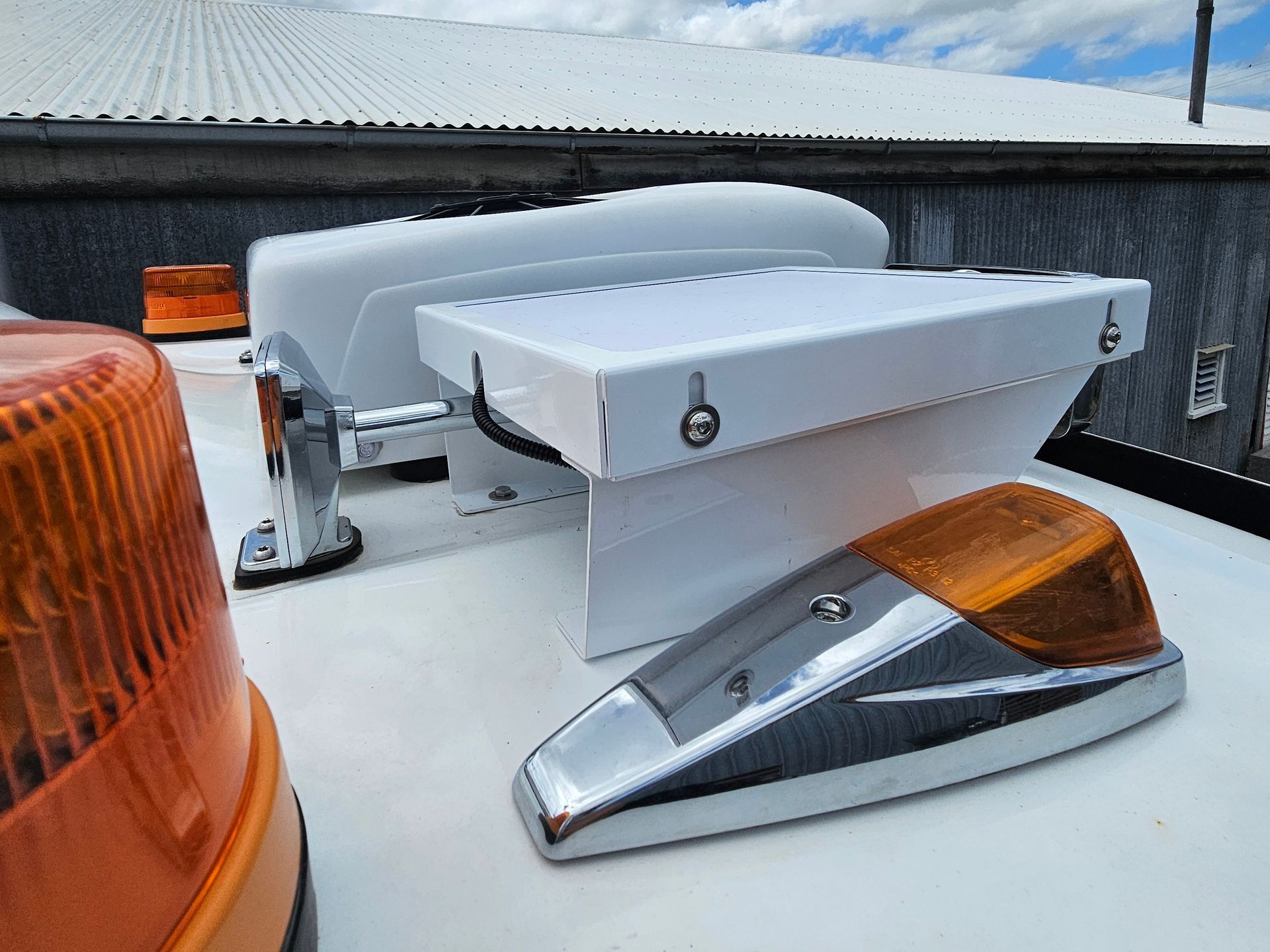 White And Orange Emergency Lights On A White Roof — Bigdog Welding and Fabrication Pty Ltd In Currajong, QLD