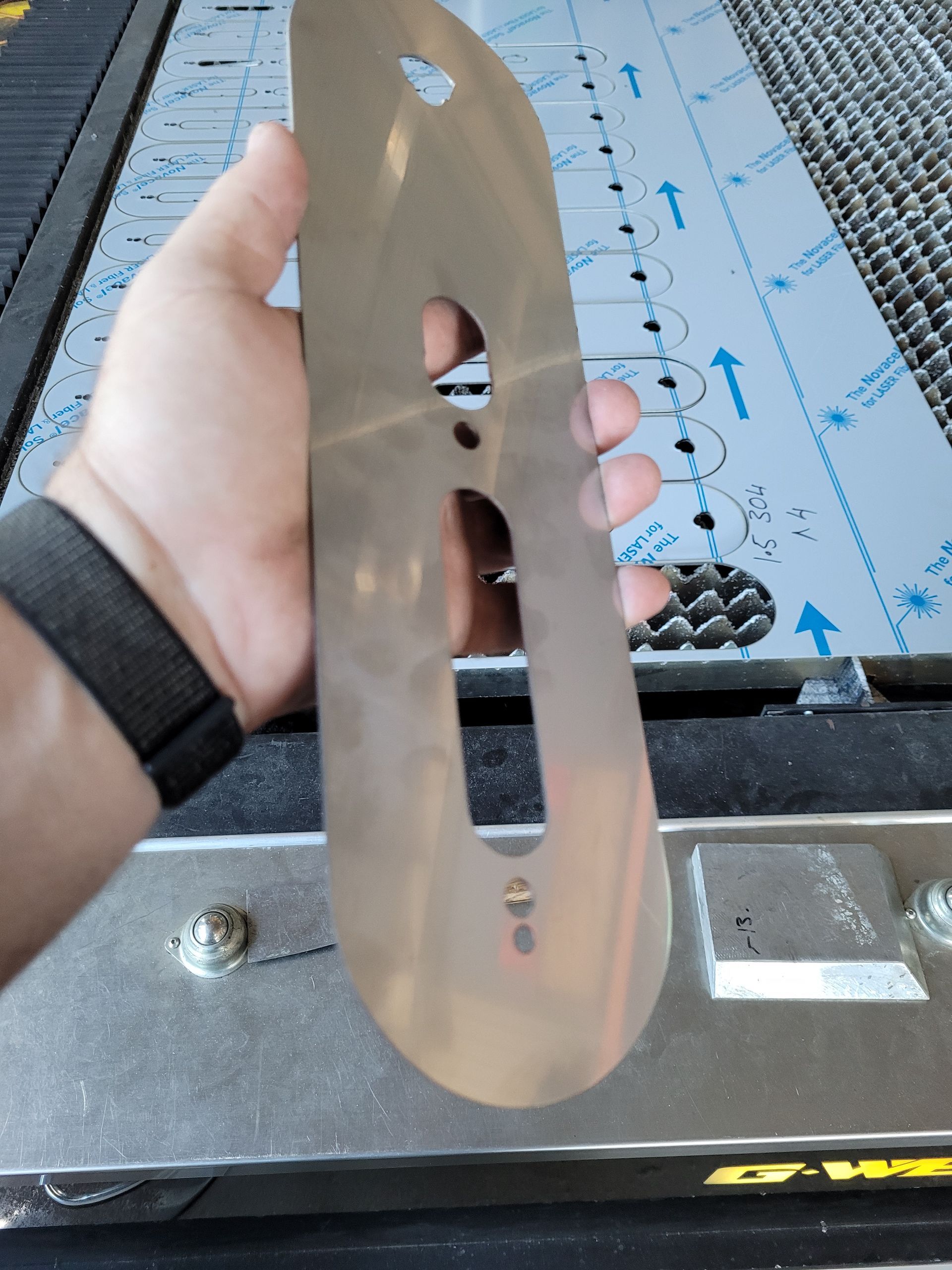 A person is holding a piece of metal in their hand — Bigdog Welding and Fabrication Pty Ltd In Currajong, QLD