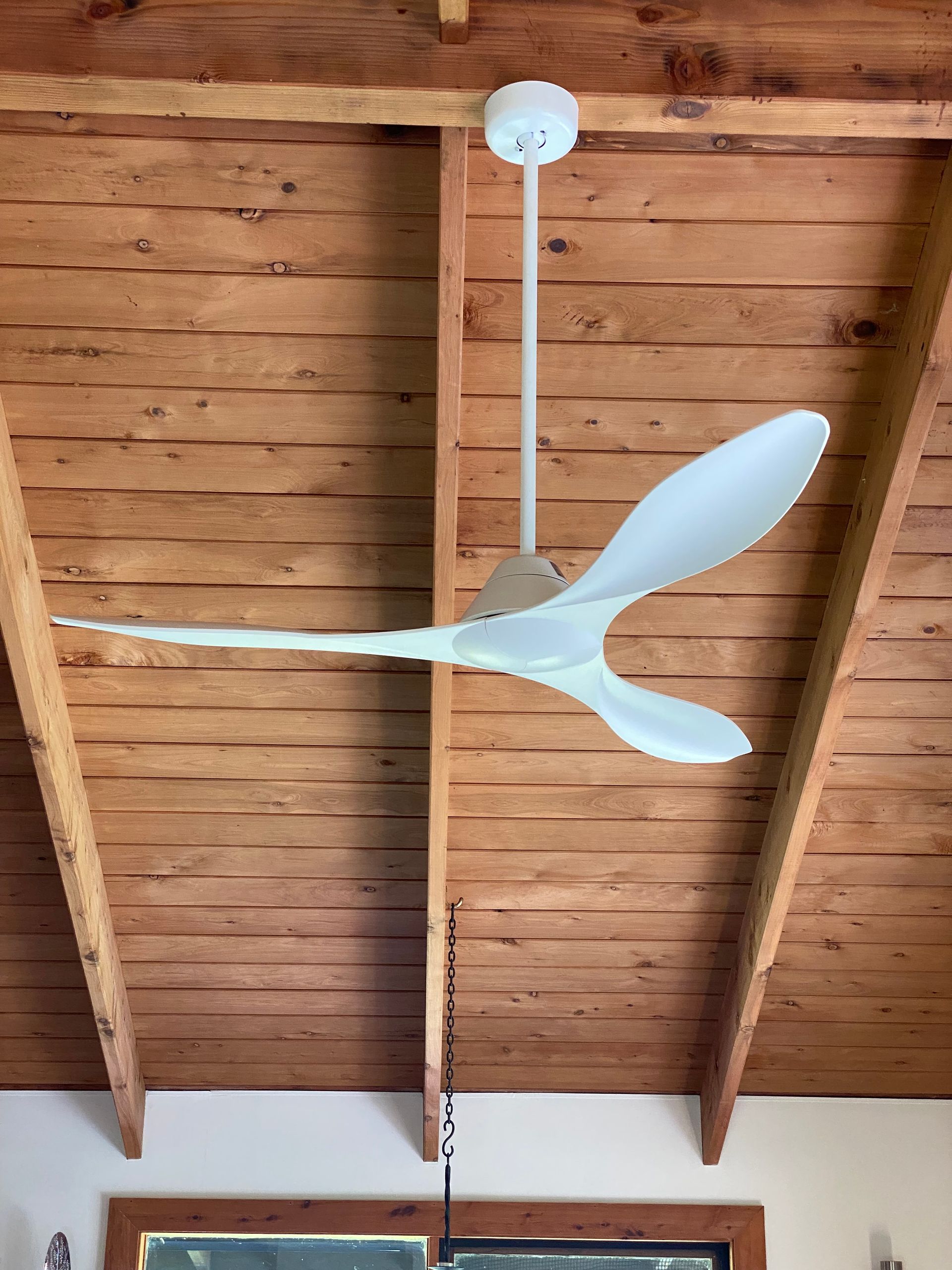 A Ceiling Fan is Hanging From wooden ceiling — Brightway Electrical in Ballina, NSW