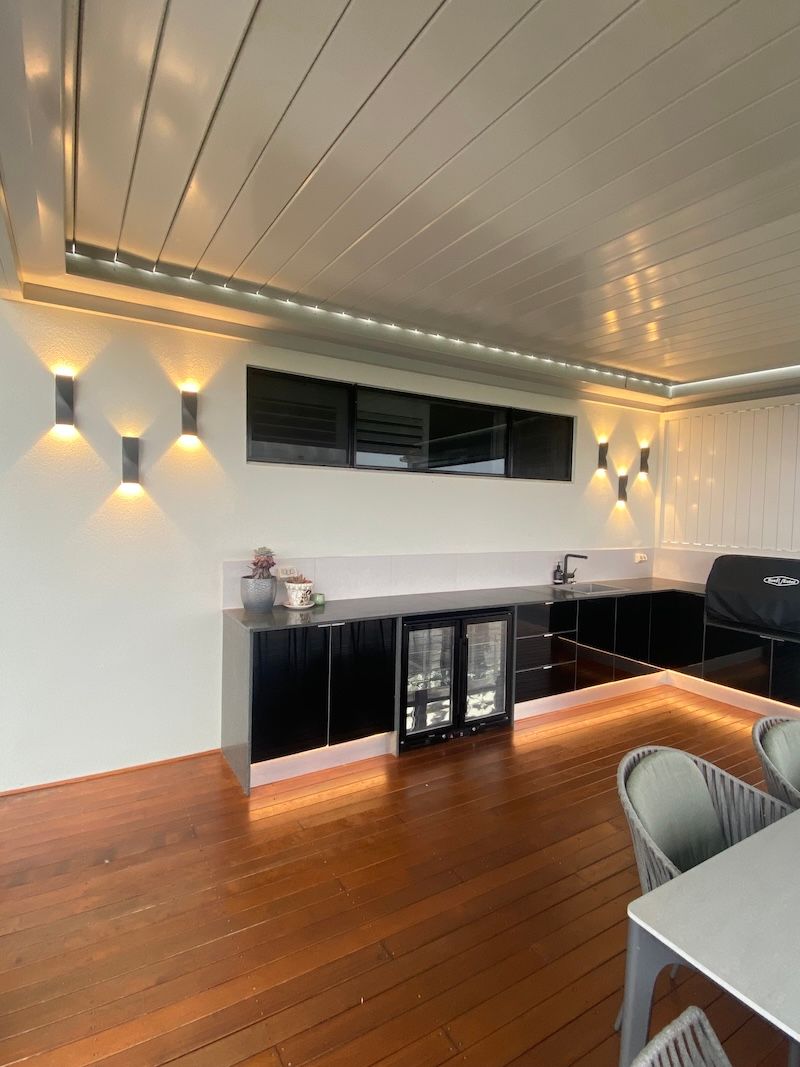 A Kitchen with a Wooden Floor and Many Lights — Brightway Electrical in Alstonville, NSW
