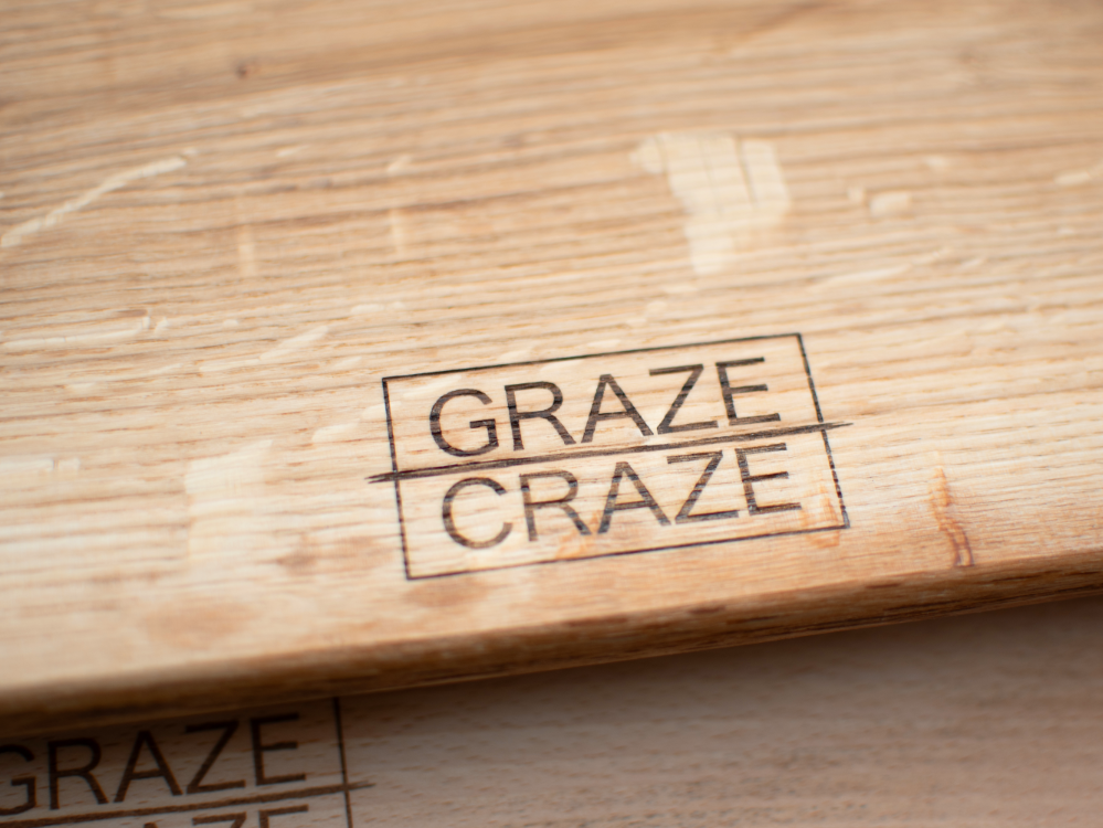 A close up of a graze craze grazing board.