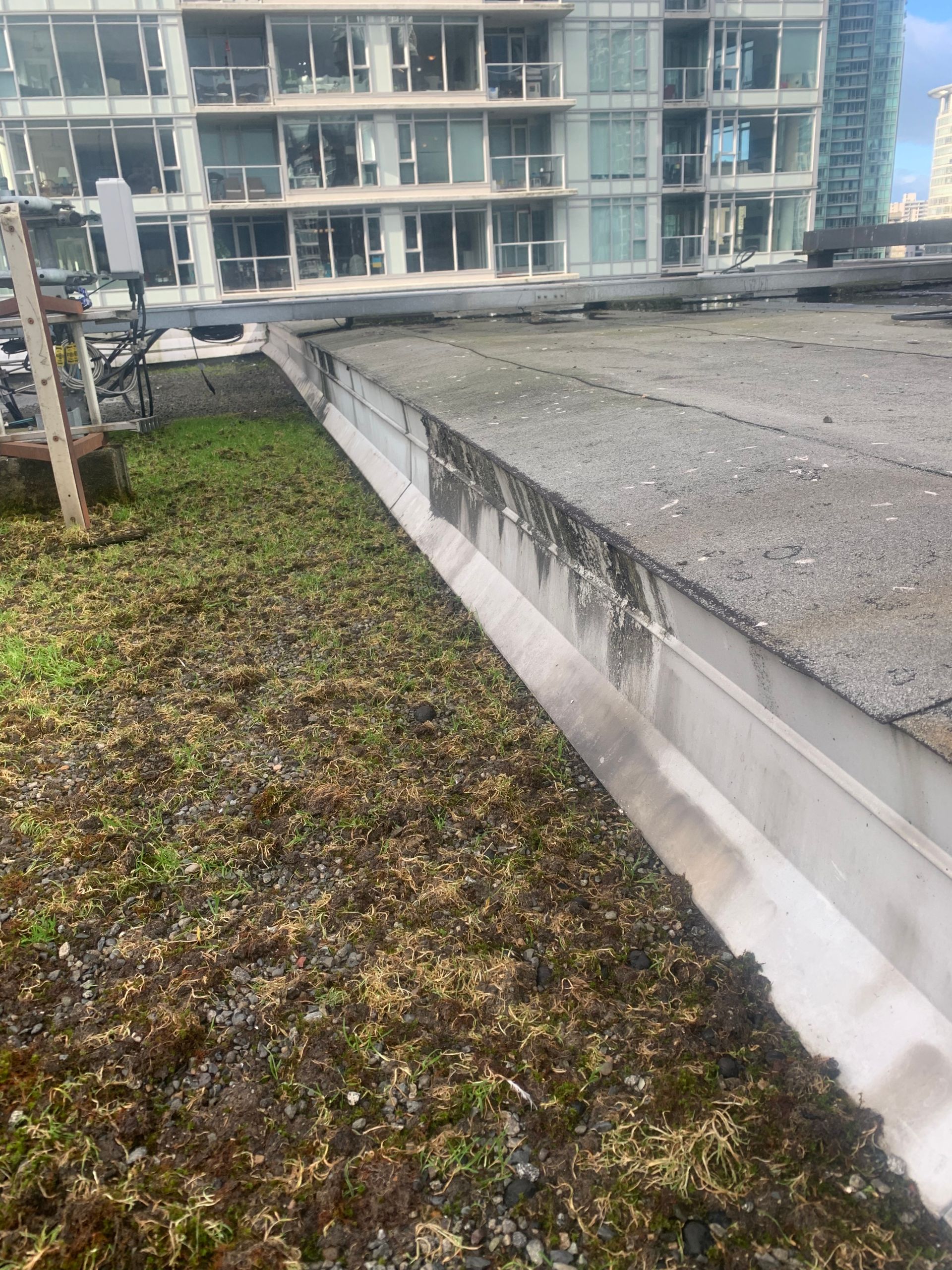 Aurora Roofing Worker Installing Metal Cladding