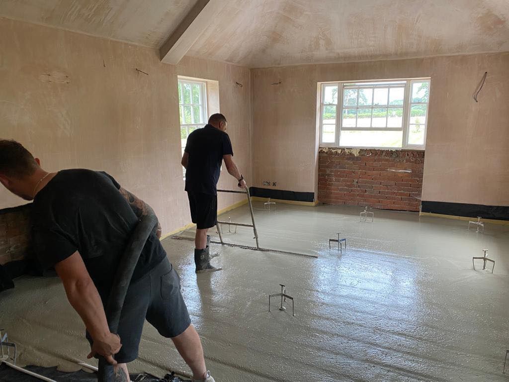 men screeding floor