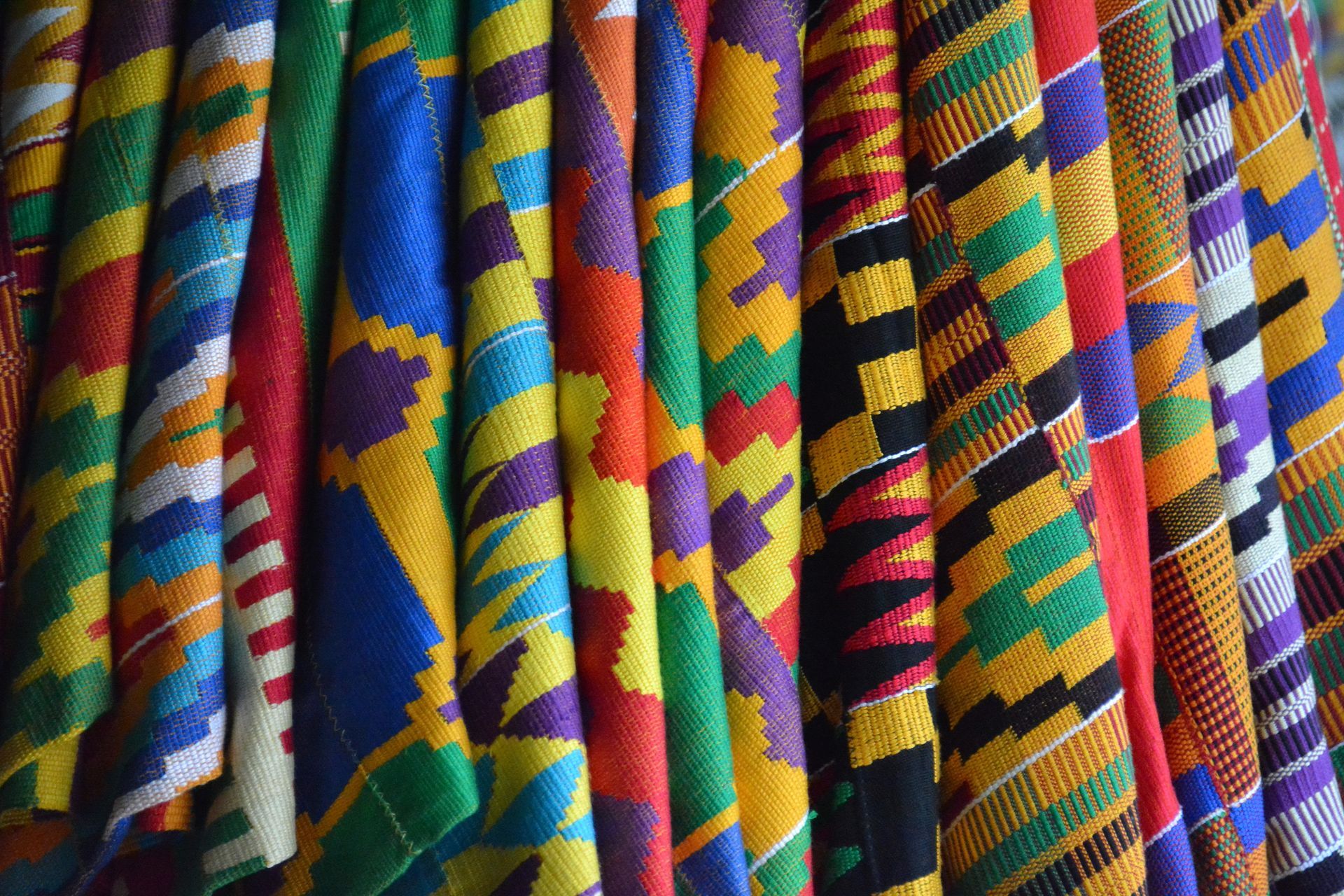 Colorful Kente cloth textiles blog cover.
