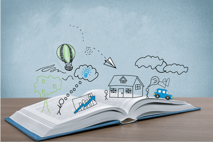 An open book with drawings coming out of it