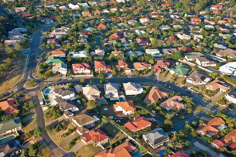 Aerial View of a Suburban Neighborhood With Houses, Streets, and Trees — Diamond Real Estate QLD in Murrumba Downs, QLD