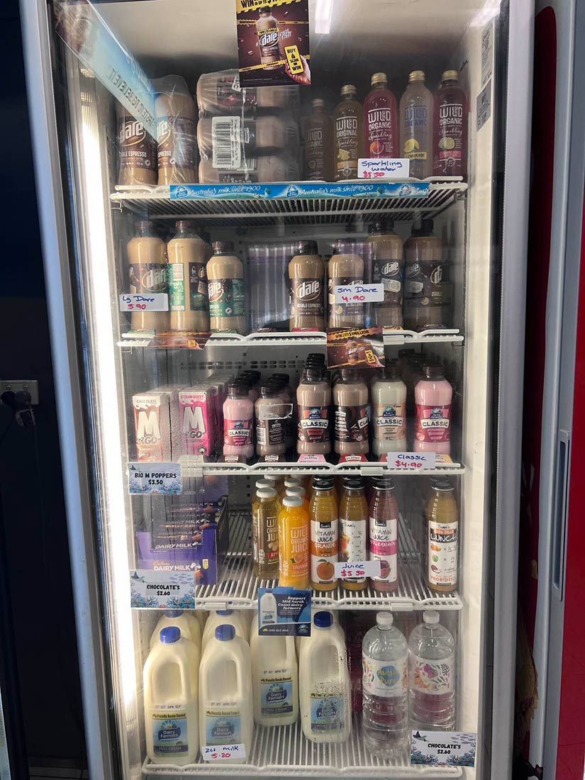 A Refrigerator Filled With Lots of Drinks and Food — Deep Sea Delights in Taree, NSW