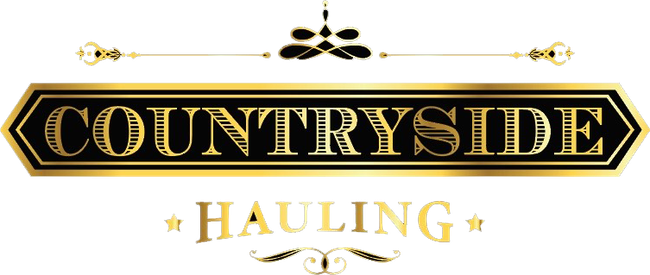 The logo for countryside hauling is black and gold.