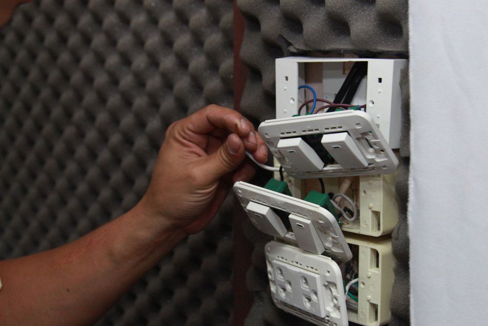 Electrician Renovating Switches and Socket — Electrical Renovations in Albury, NSW