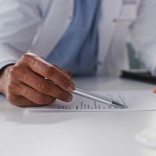 Doctor Reading Test Results — Colorado Springs, CO — Dynamic Family Medicine Doctor Reading Test Results — Colorado Springs, CO — Dynamic Family Medicine