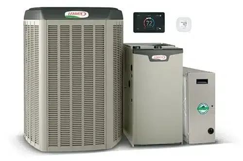 HVAC system components: large outdoor condenser, indoor furnace, thermostat, and air cleaner in gray metal finishes