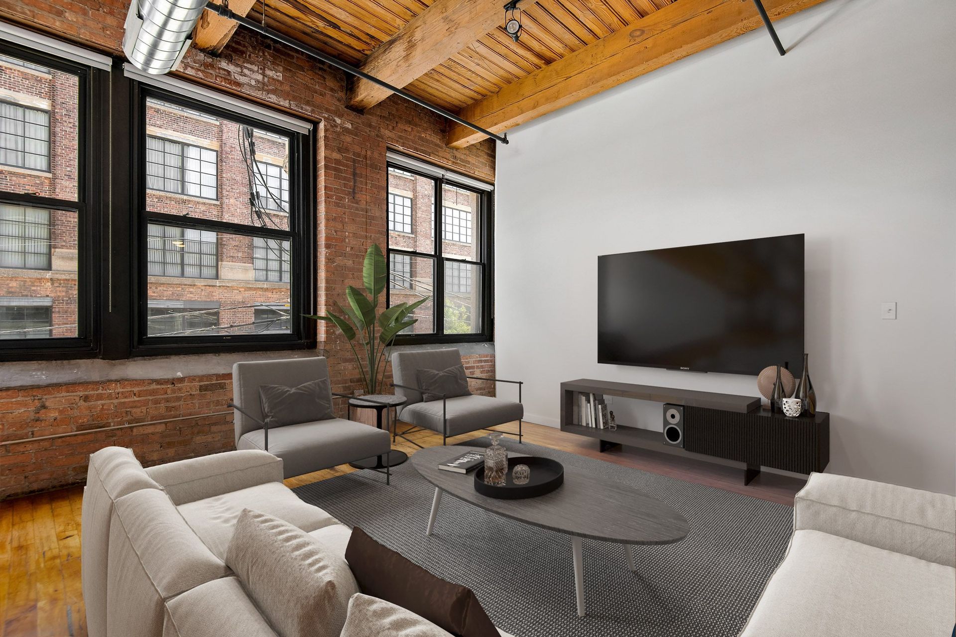 Loft Living Room with Windows t the Lofts at Gin Alley, Chicago, IL 60607