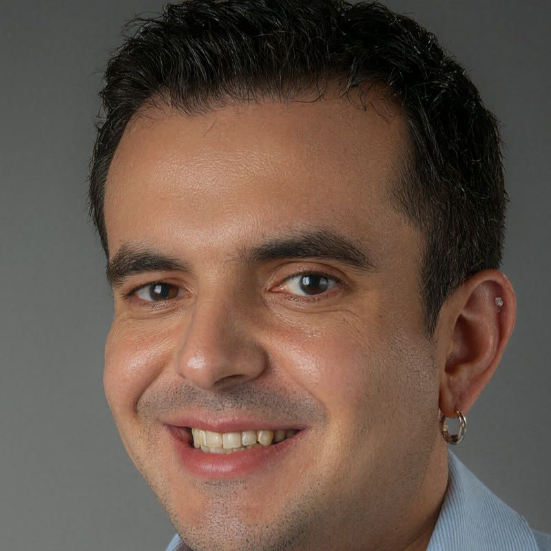 Portrait of JC smiling