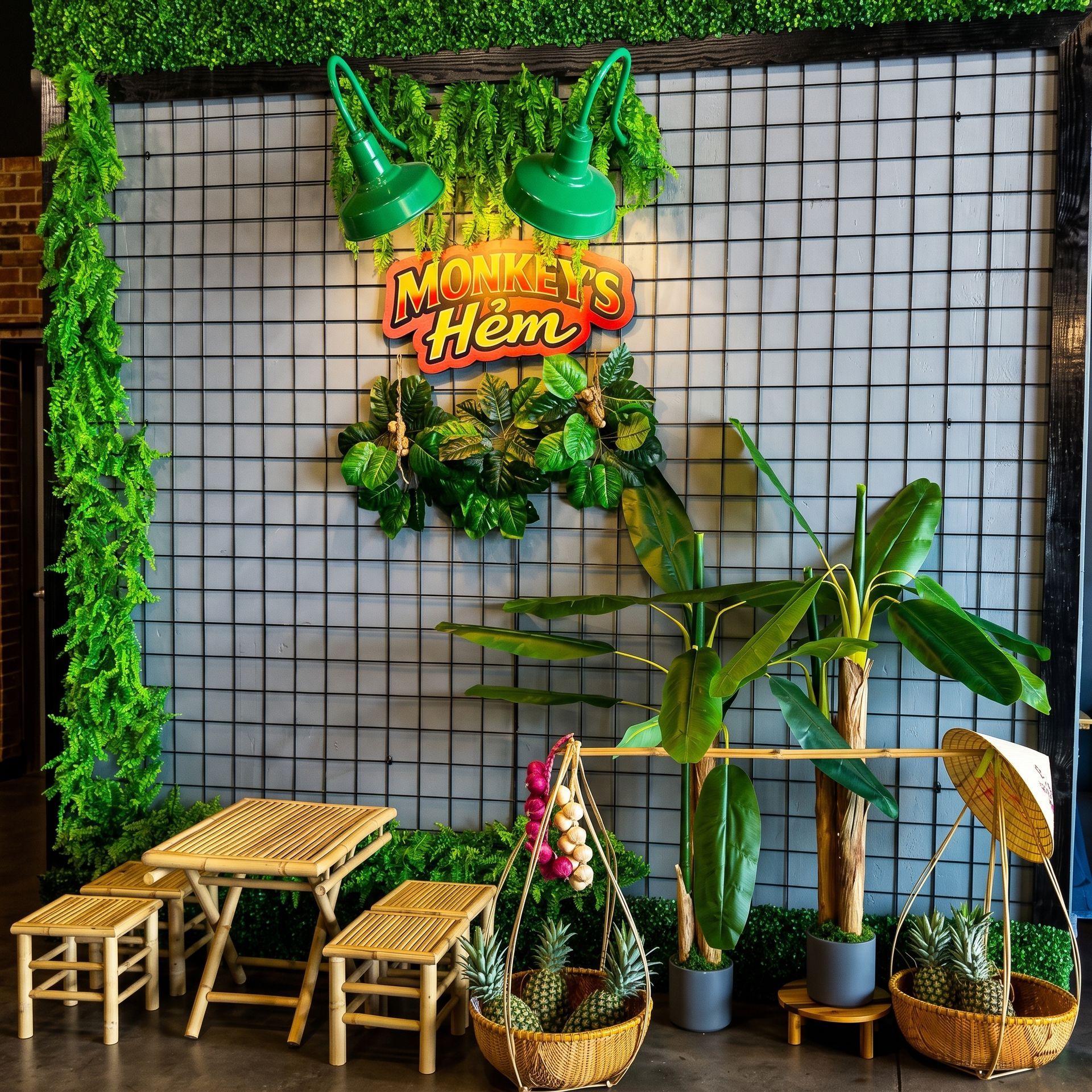 Decorative plant display with lattice wall, green signs, small wooden stools, and potted tropical plants