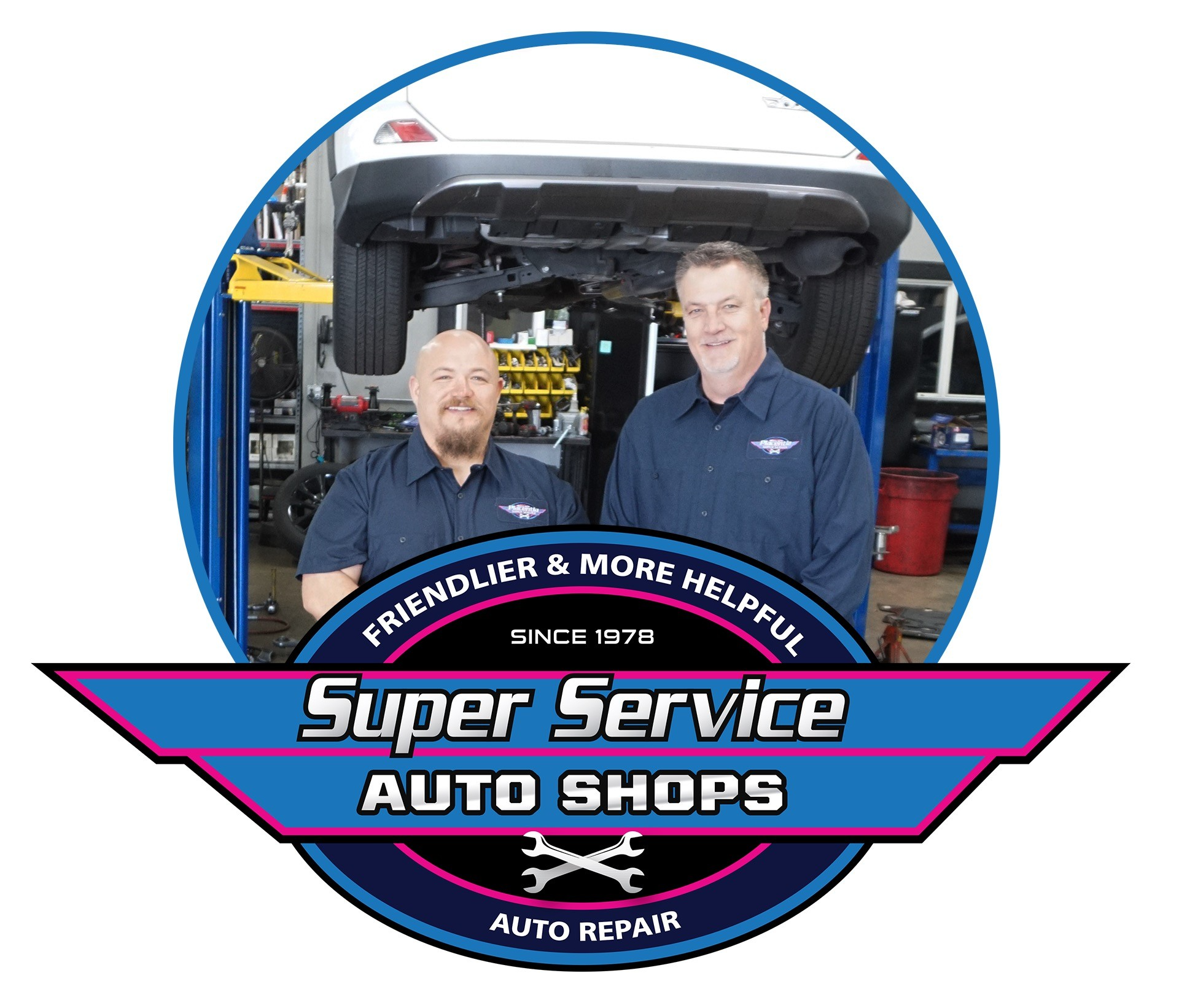 Two men in auto shop uniforms, smiling, with car on lift; Super Service Auto Shops logo. | Super Service of Aliso Viejo