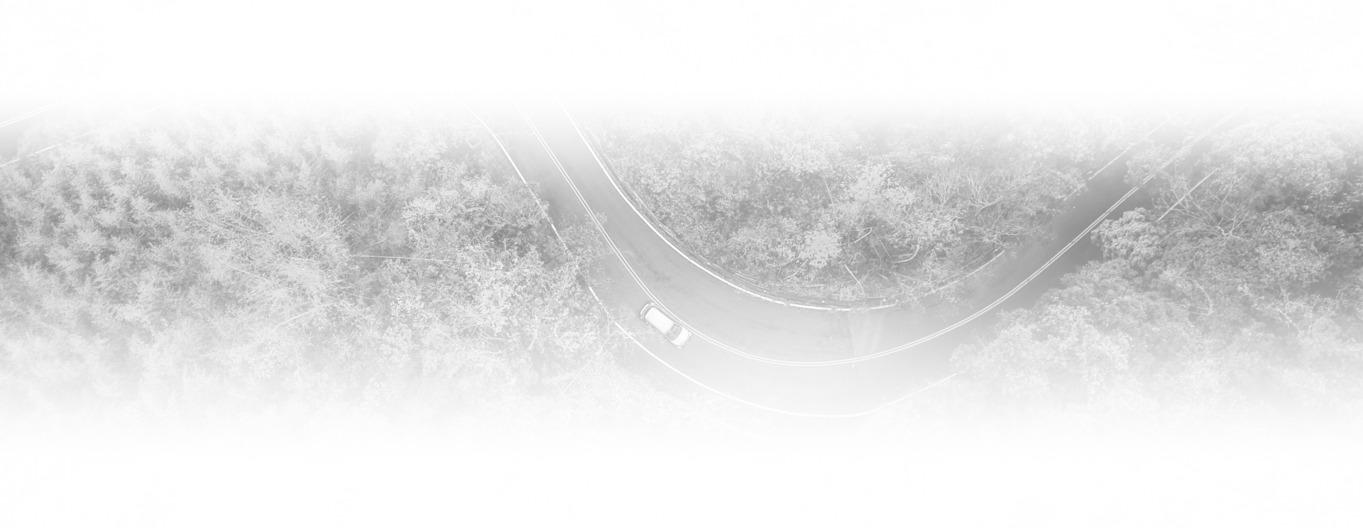 Top view of car driving on road | CARma Auto Care