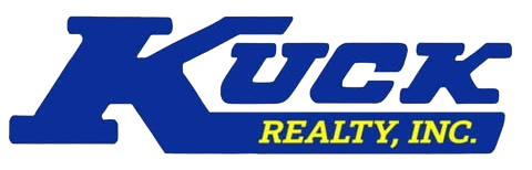 Kuck Realty, Inc. logo in blue and yellow italic text