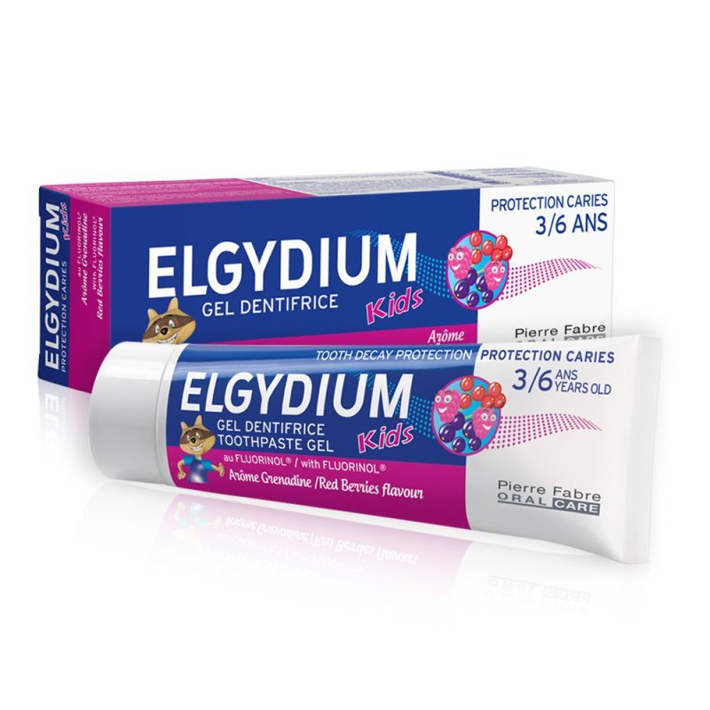 Tubos y caja de pasta de dientes ELGYDIUM Kids en azul y rosa, para niños de 3 a 6 años o más.