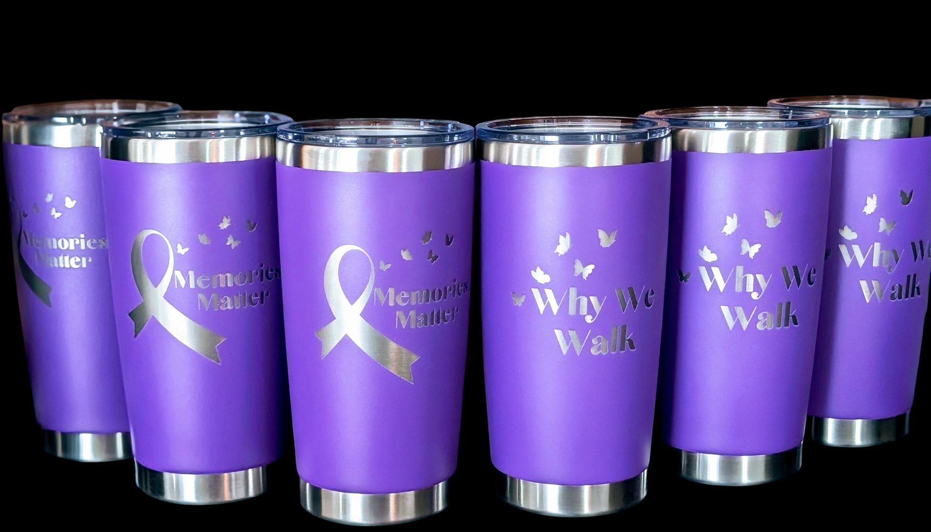 Purple tumblers with silver engraving of awareness ribbons and 