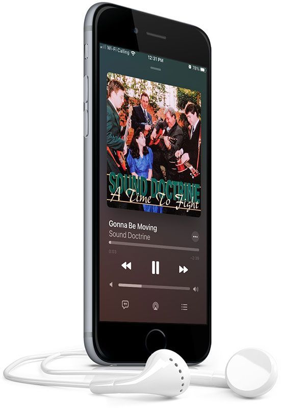 A cell phone with headphones attached to it is playing a song.
