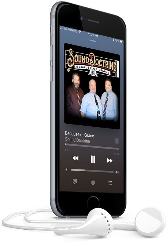 A cell phone with headphones attached to it is playing a song.