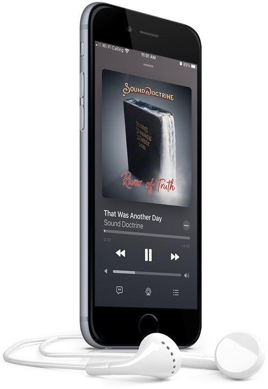 A cell phone with earbuds attached to it is playing a song.