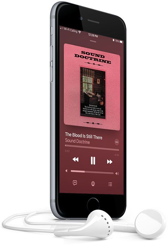A cell phone with headphones on it is playing a song.